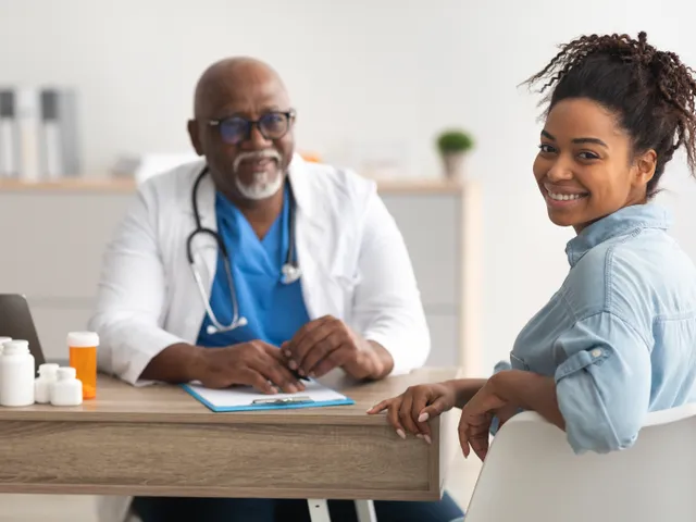 Provider and patient in a warm consultation at Alvin-Manvel Family Clinic